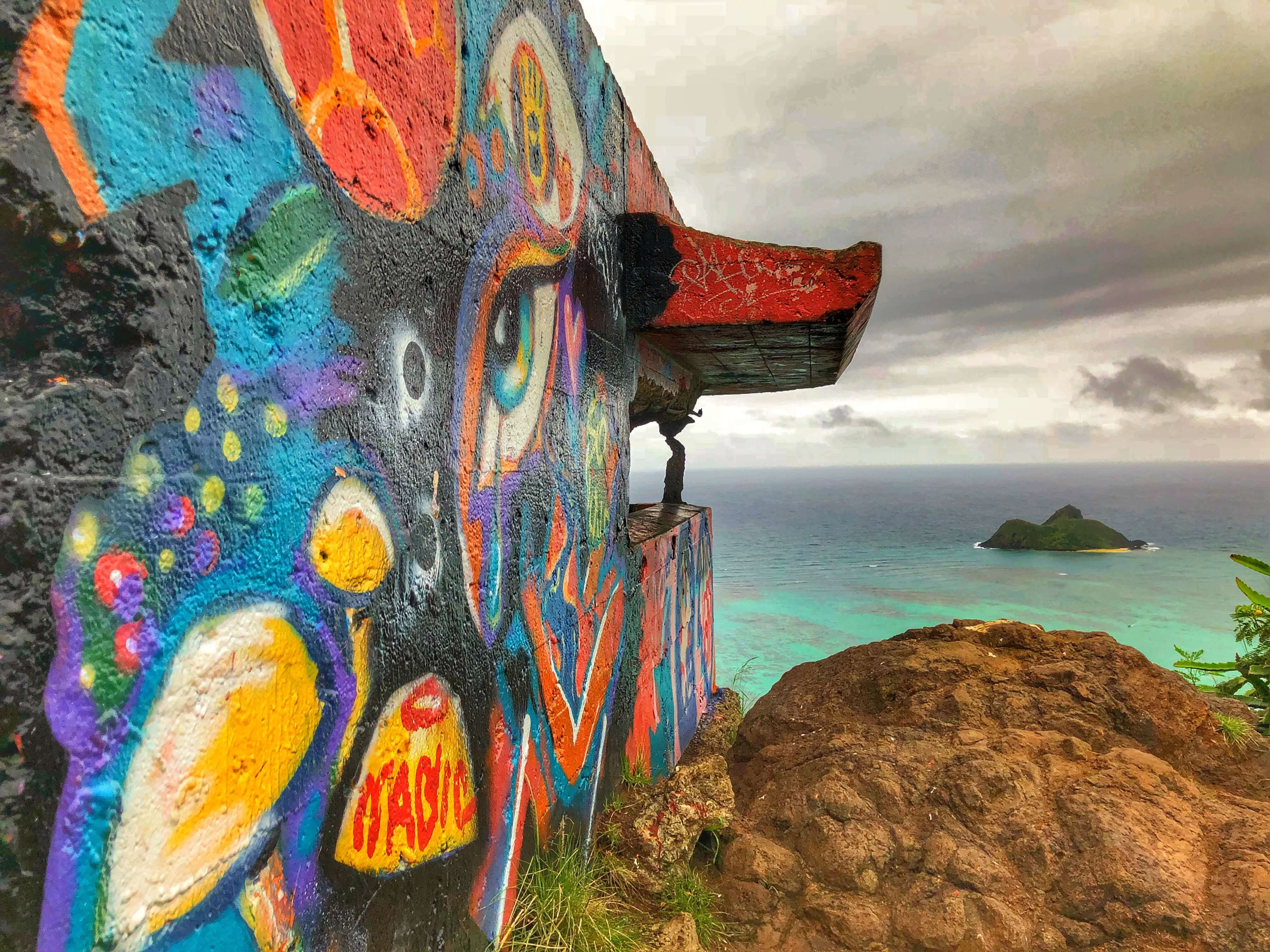 graffiti alongside the lanikai pillbox hike, overlooking the ocean view