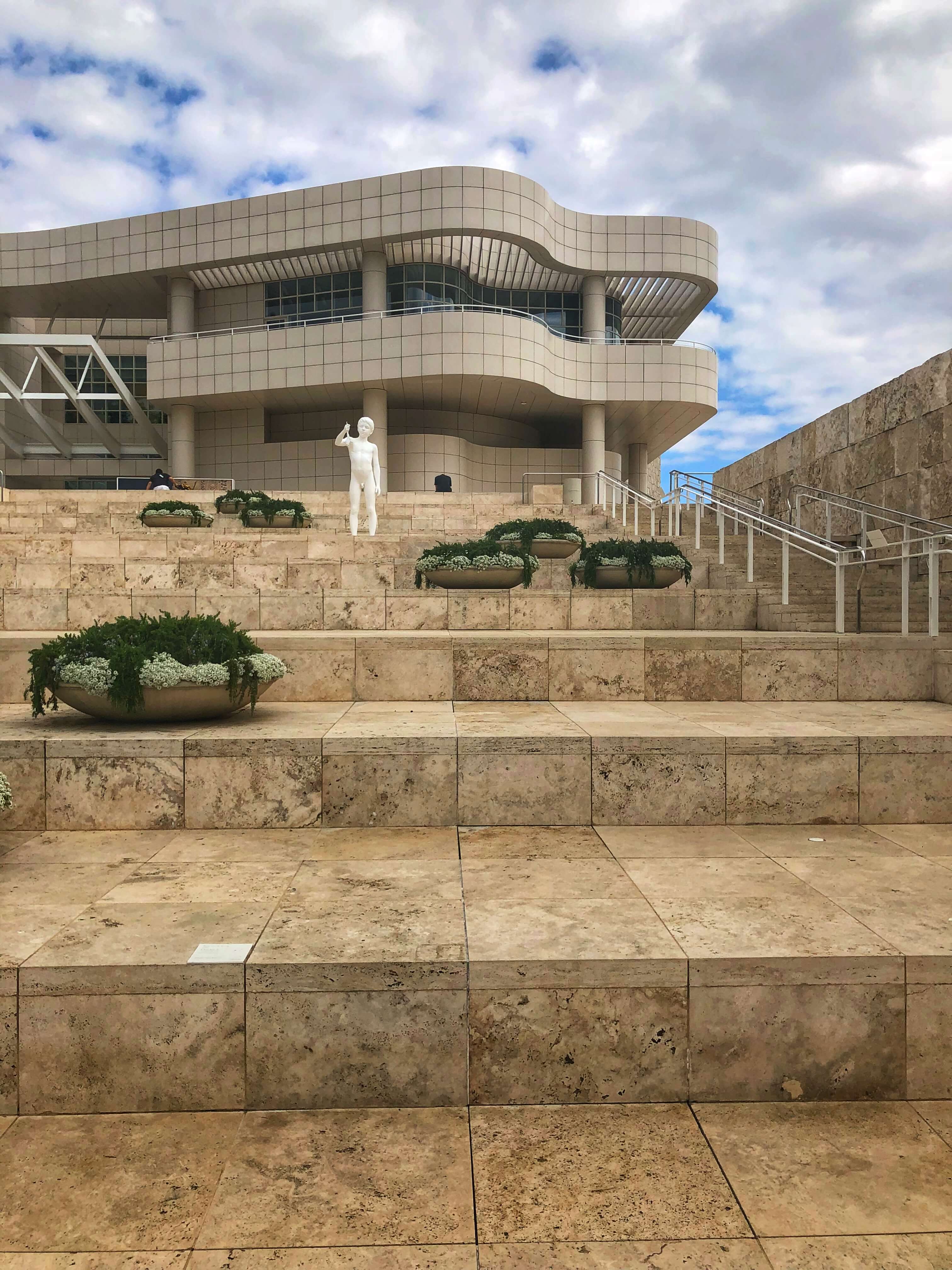 Travertine tiles outside the front of the Getty Museum, modern architecture contrasts the skyline