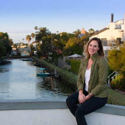 Me sitting on a bridge that crosses over the Venice Canals!