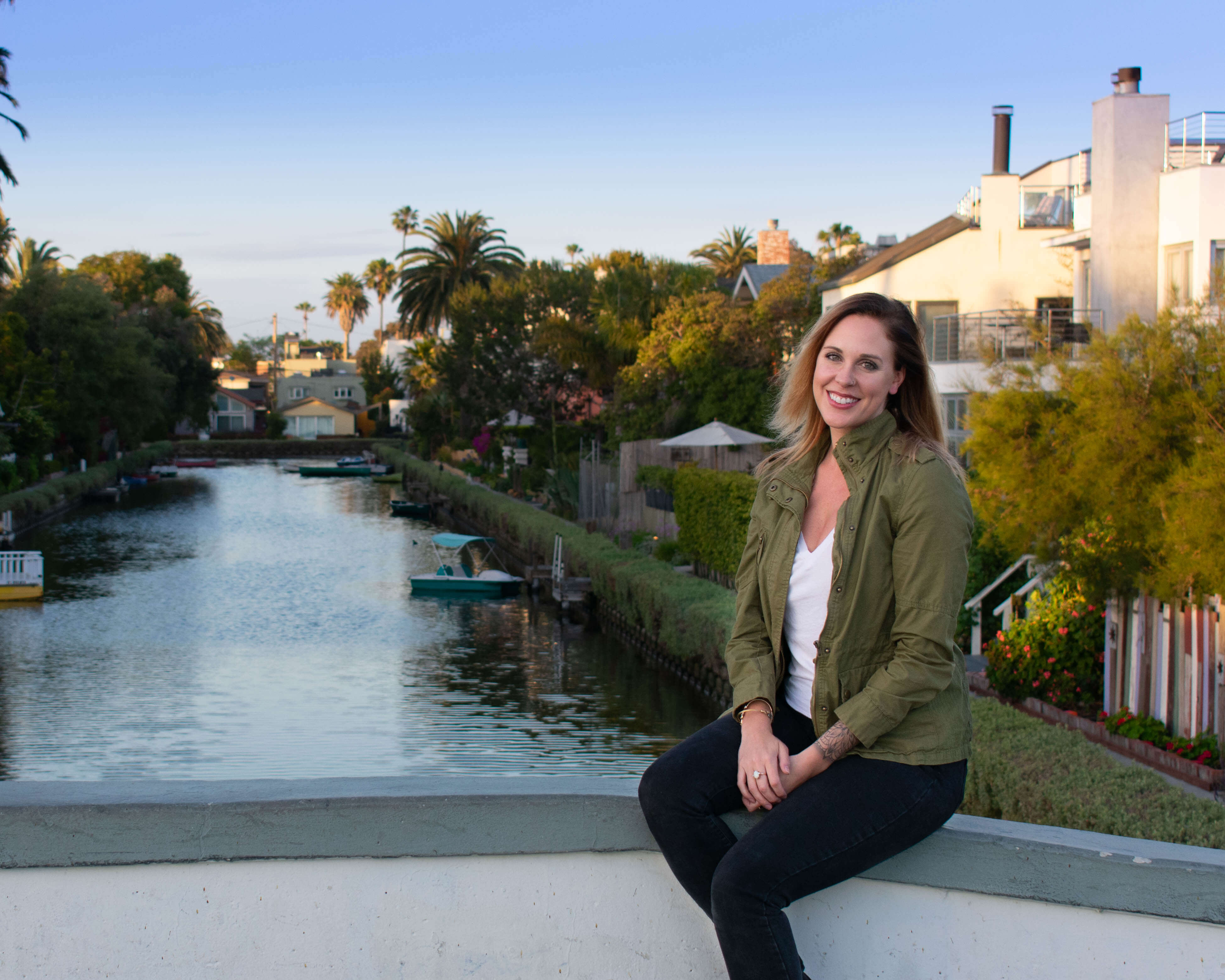 Me sitting on a bridge that crosses over the Venice Canals!