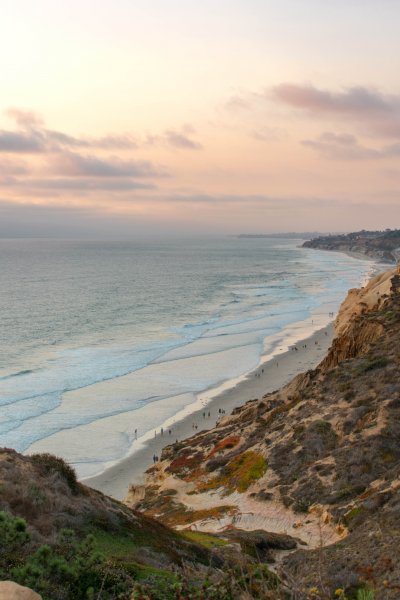 sunset view from a cliff overlooking the ocean at Torrey pines state park