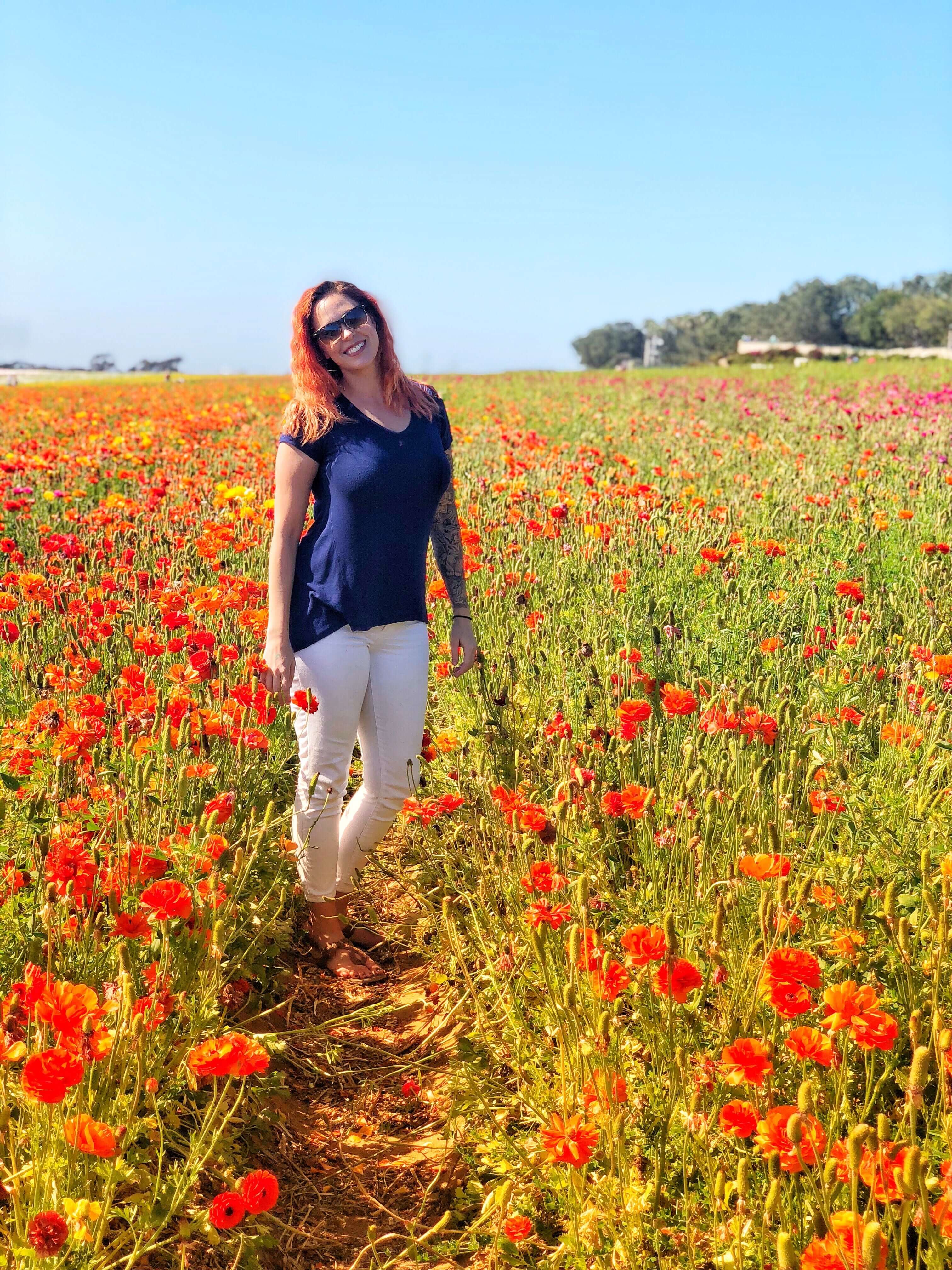 me in the flower fields with orange flowers